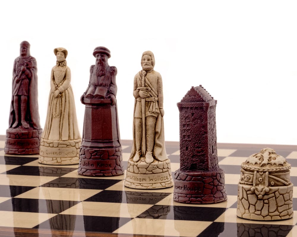 Berkeley Chess Scottish Russet Chess Men set with intricately sculpted historical designs on a chessboard.
