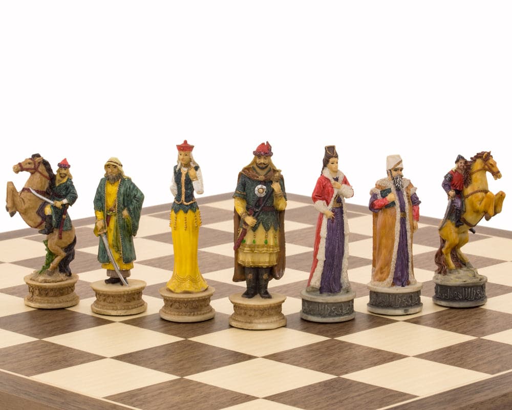 Hand painted Hungarians vs Turkish themed chess pieces by Italfama on chessboard.