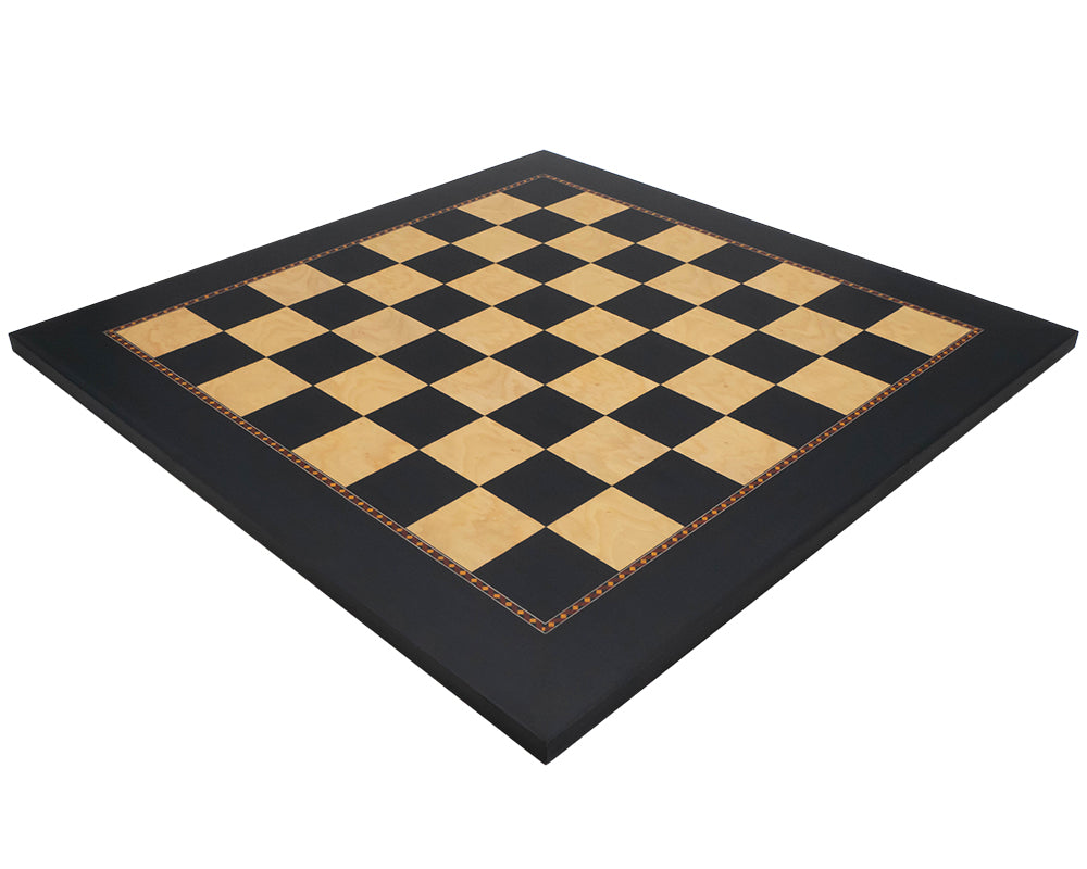 The Queen's Gambit black dyed poplar and ash root chess board by Rechapados Ferrer. 19.7 inch board with 1.96 inch squares, crafted in Spain.