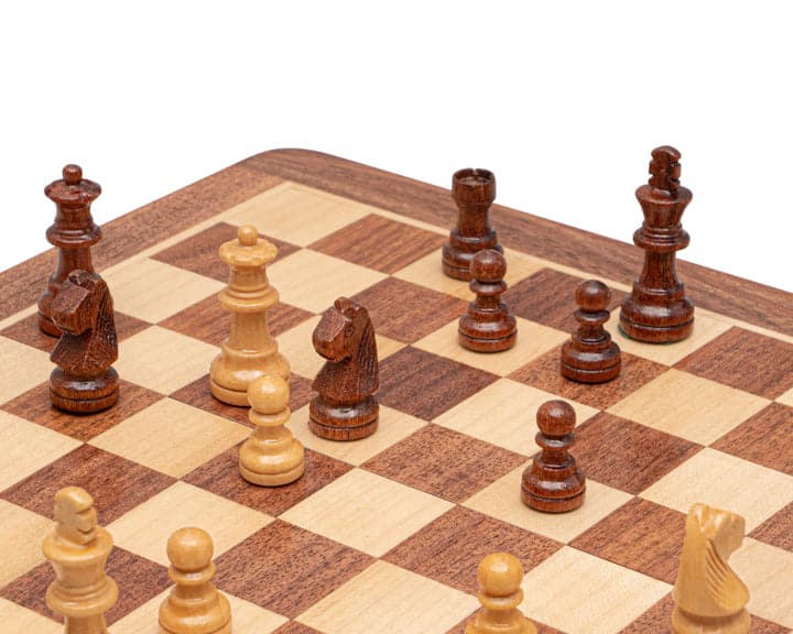 Wooden travel chess set with magnetic Staunton-style chess pieces on a 10-inch folding board
