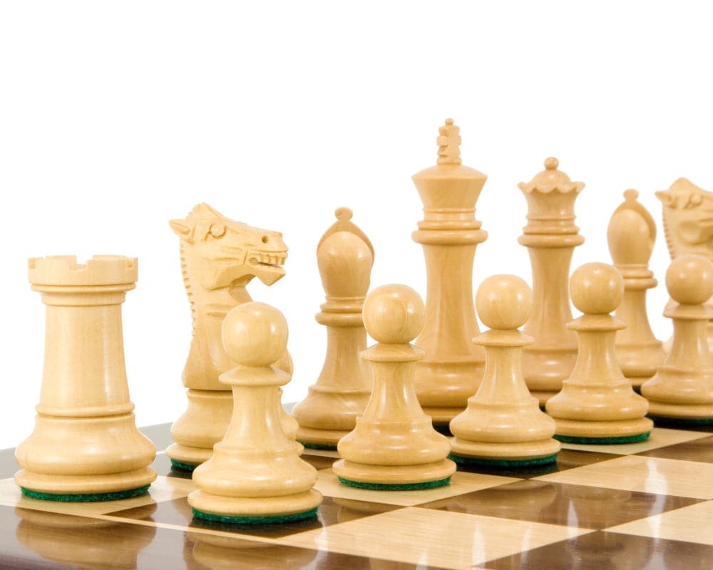 Rosewood Staunton chess pieces on a board, featuring a detailed knight and bishop, part of the Windsor Series with a 3-inch king.