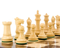 Rosewood Staunton chess pieces on a board, featuring a detailed knight and bishop, part of the Windsor Series with a 3-inch king.