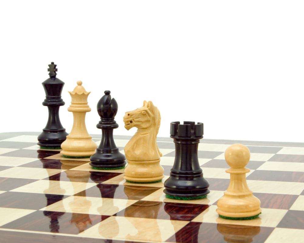 Fierce Knight Ebonised Staunton chessmen with 3-inch King on chessboard, handcrafted Boxwood, black and natural pieces for a 16-inch board