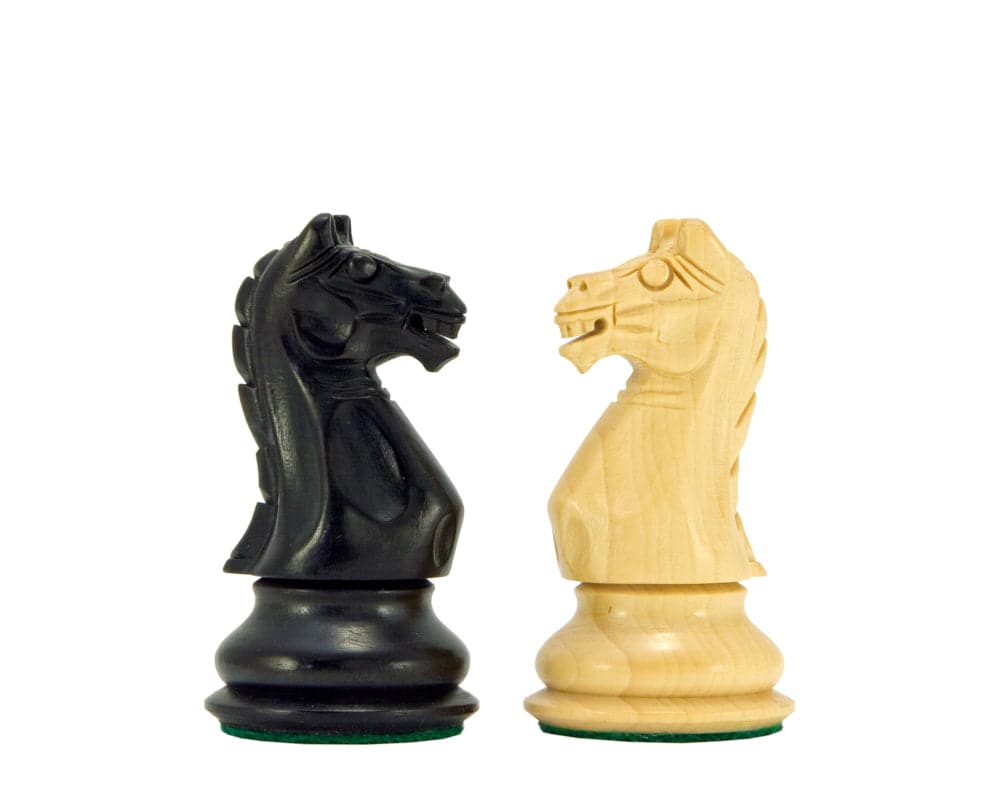 Ebonised boxwood and natural boxwood chess knights from the Oxford Series, hand crafted and detailed.