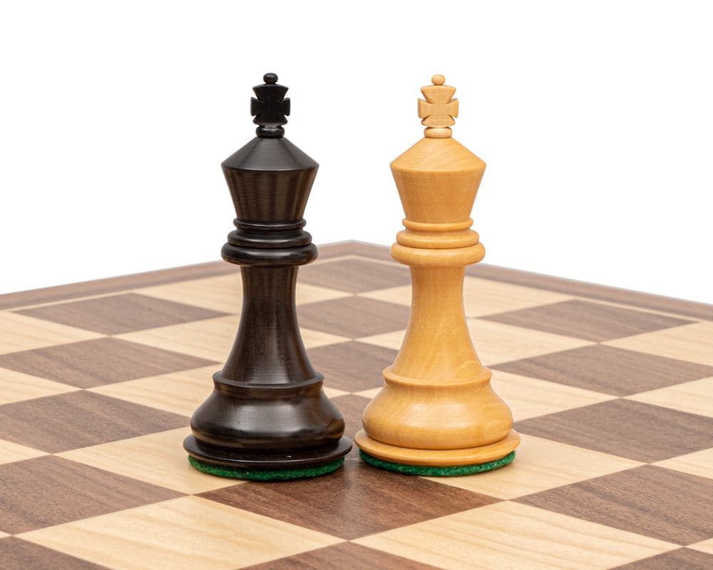 The Stallion Knight Ebonised Chess Pieces 3.5 inch Staunton design, boxwood, weighted and felted chessmen on a chessboard.