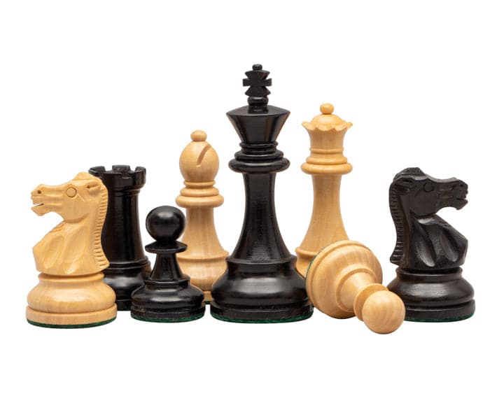 British Ebonised Chess Men in traditional Staunton design, featuring expertly carved and weighted boxwood pieces with a 3.5 inch king.