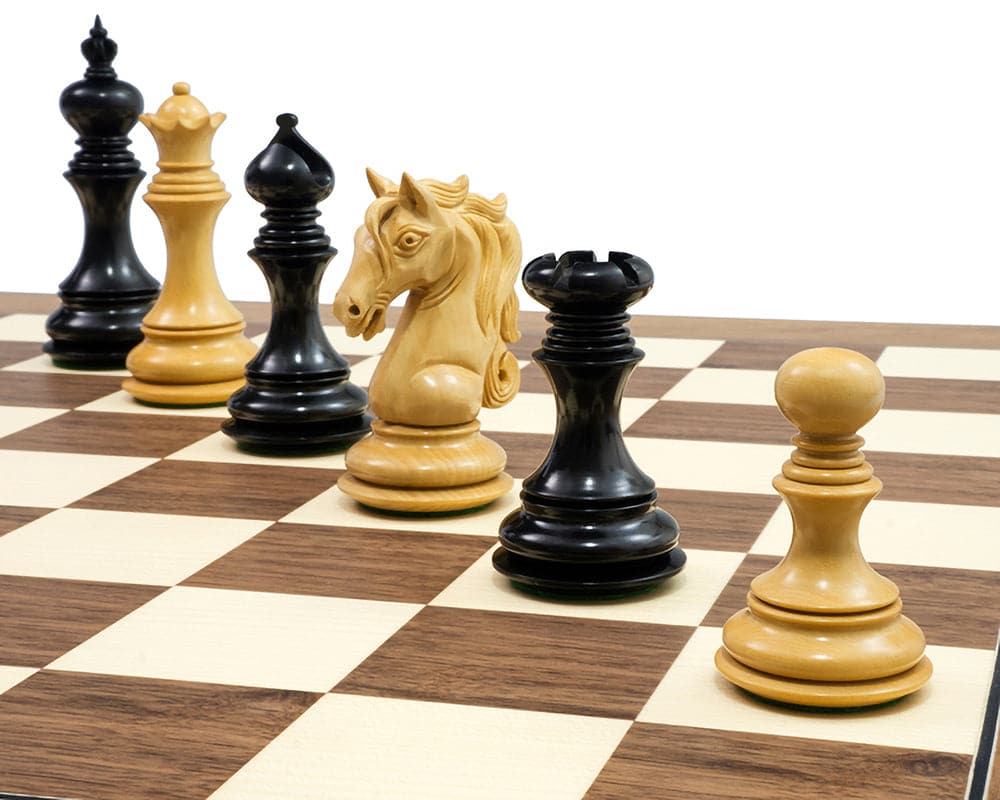 Luxury Cavalry Ebony & Walnut Chess Set with beautifully crafted knight pieces on a walnut and maple chess board.
