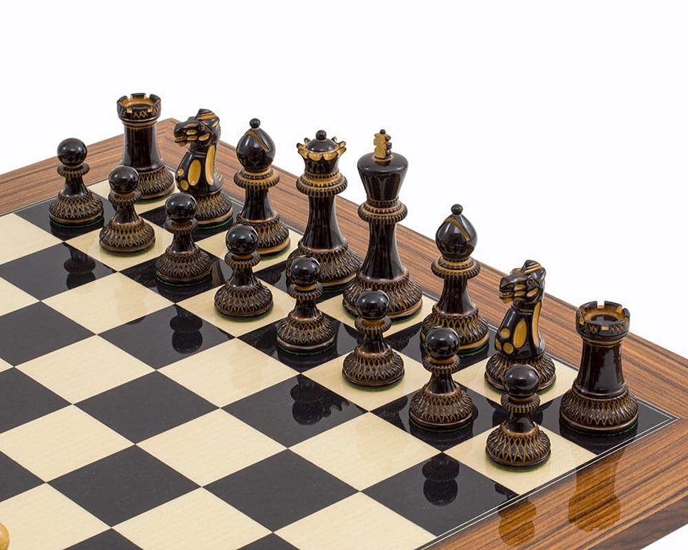 The Burnt Parker Palisander Chess Set with intricately carved, weighted pieces on a high gloss Black Anegre and Palisander Deluxe Chess Board