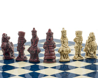 The Berkeley Chess Alice in Wonderland Cardinal Blue Chess Set