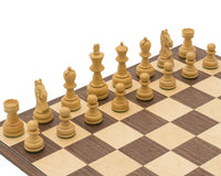 Wooden pieces on Emerald Black and Walnut Folding Chess Set ready for play.