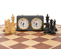 The JJ Cooke Edition Black and Mahogany Chess Set with Case and Clock